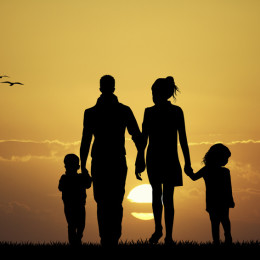 happy family at sunset